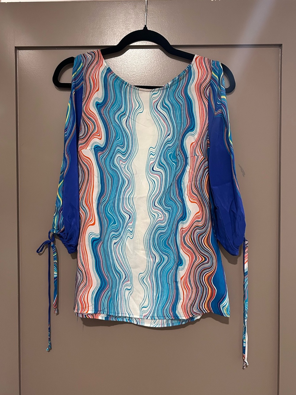 Trina Turk 100% silk blouse with arm slits